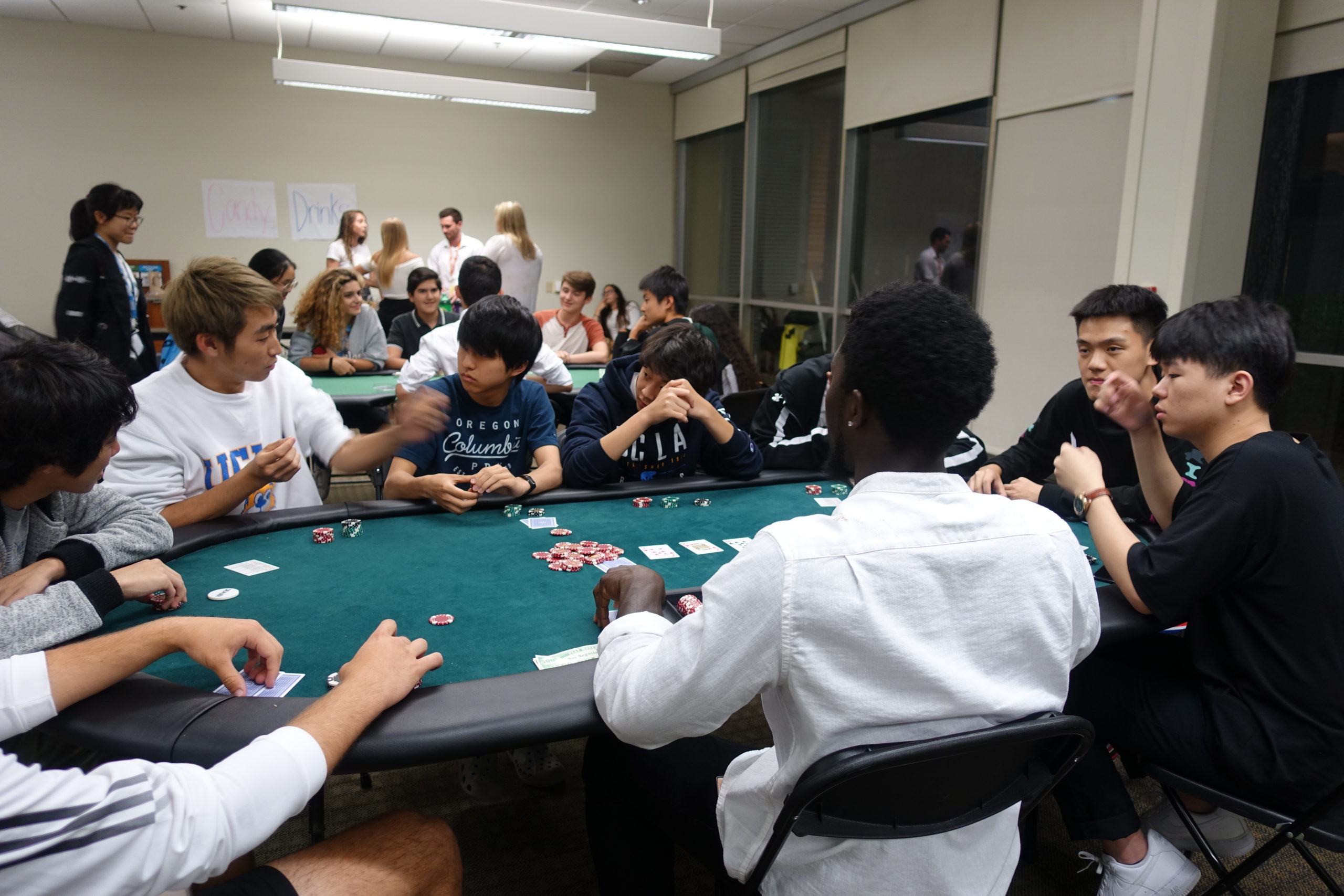 A Full Poker Table At A Casino-themed Event