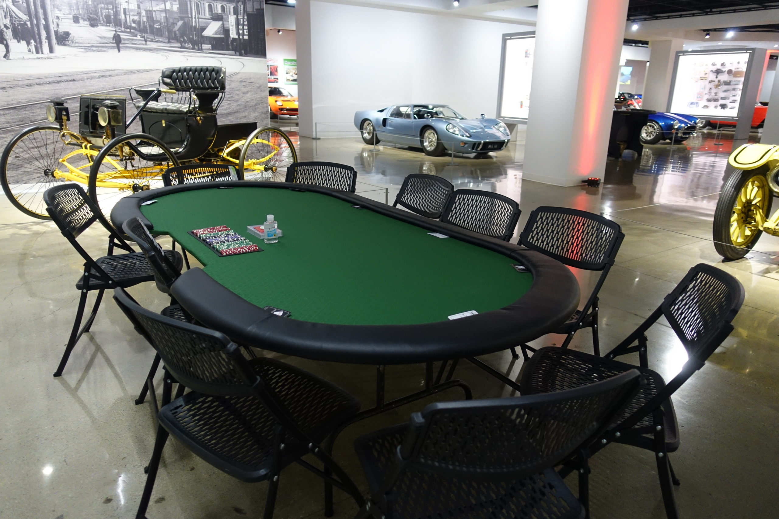 A Poker Table With Chairs At A Casino-themed Event
